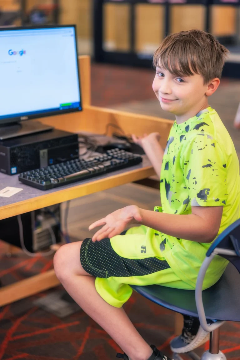 a child using a library computer